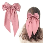 Ozdobna kokarda do włosów na spince różowa