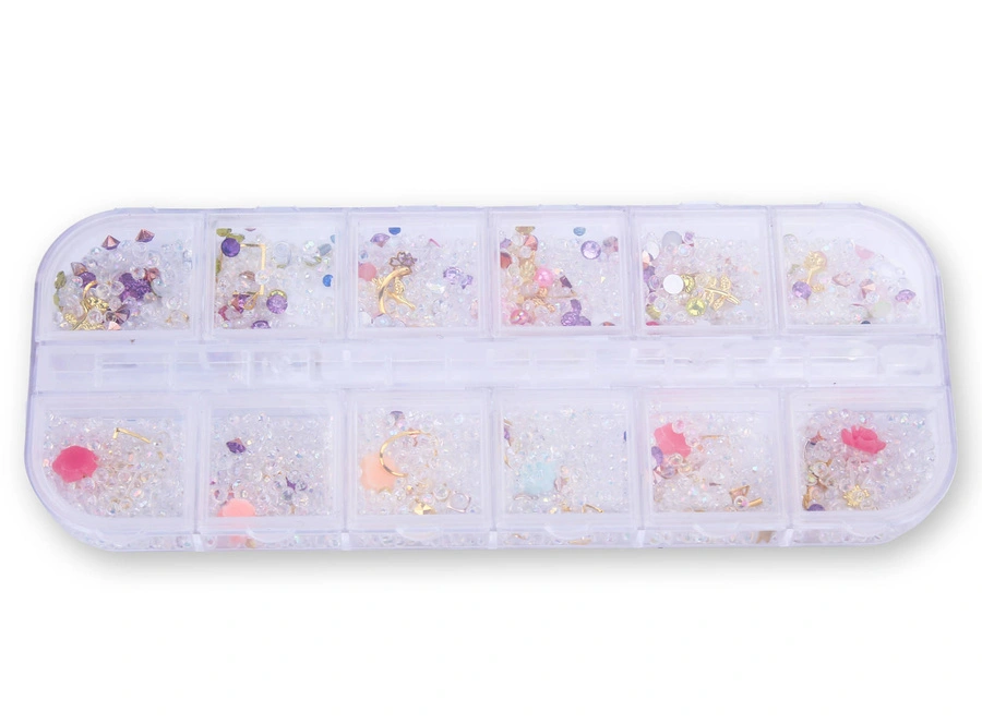 Zestaw ozdób do paznokci mix kryształki, różyczki, złote elementy - kasetka