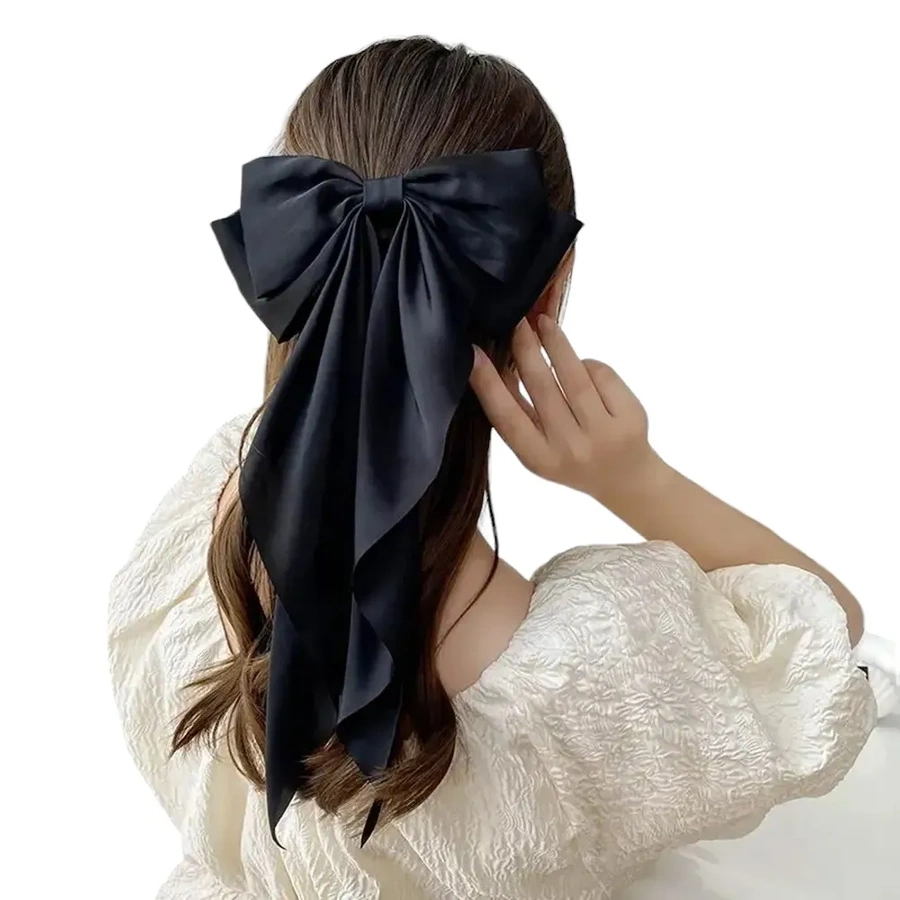 Ozdobna kokarda do włosów na spince czarna