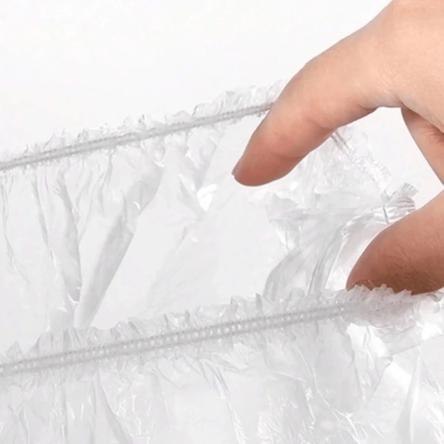 Jednorazowy czepek foliowy na włosy 100 sztuk