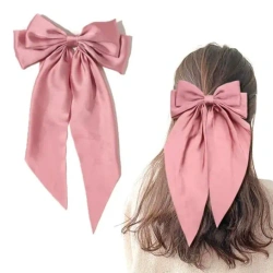 Ozdobna kokarda do włosów na spince różowa